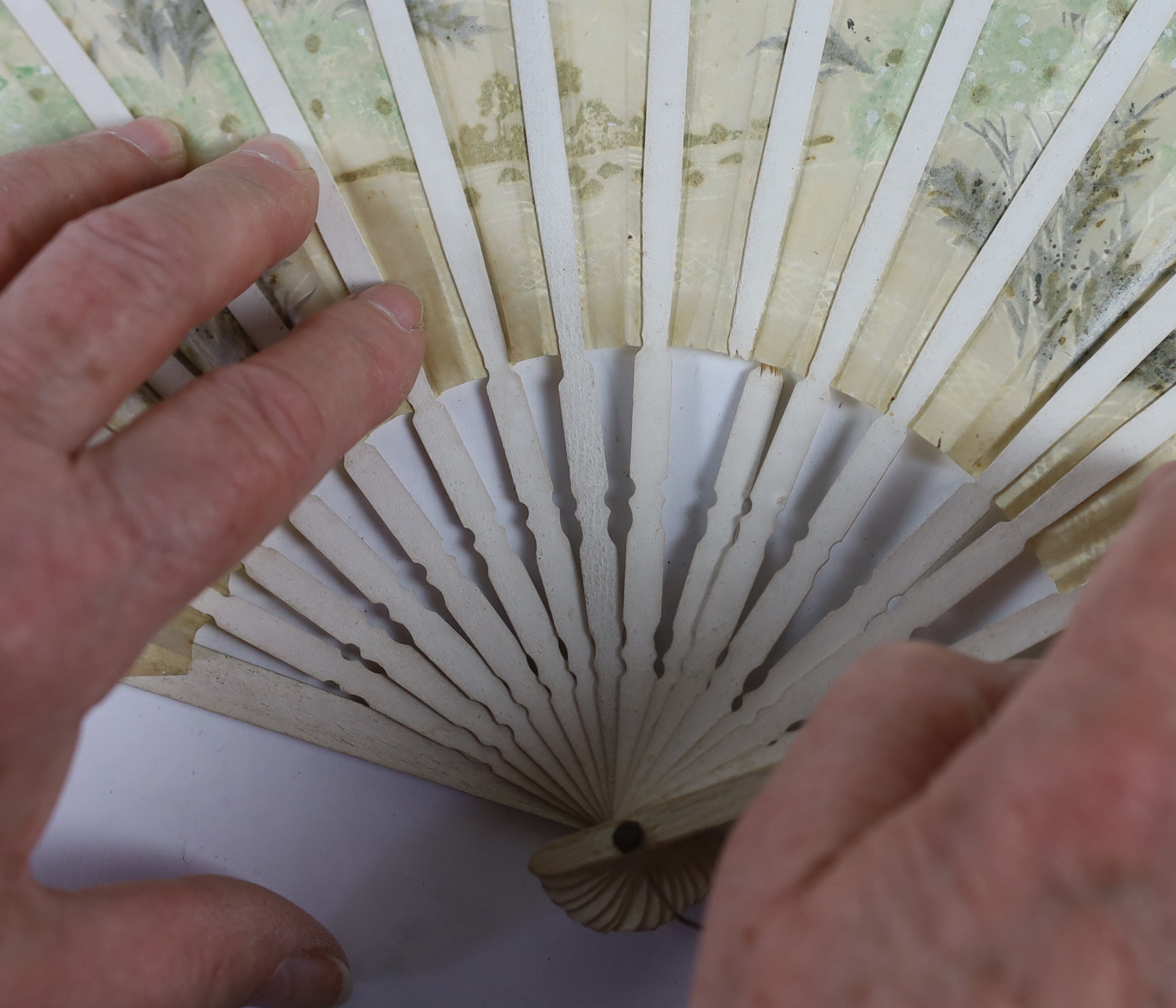 A collection of 19th and 20th century mostly paper fans, ten in reasonable condition useful for stage and film (16)